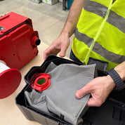 Reusable dust bag for Milwaukee M18 Fuel Packout shown with vacuum accessories