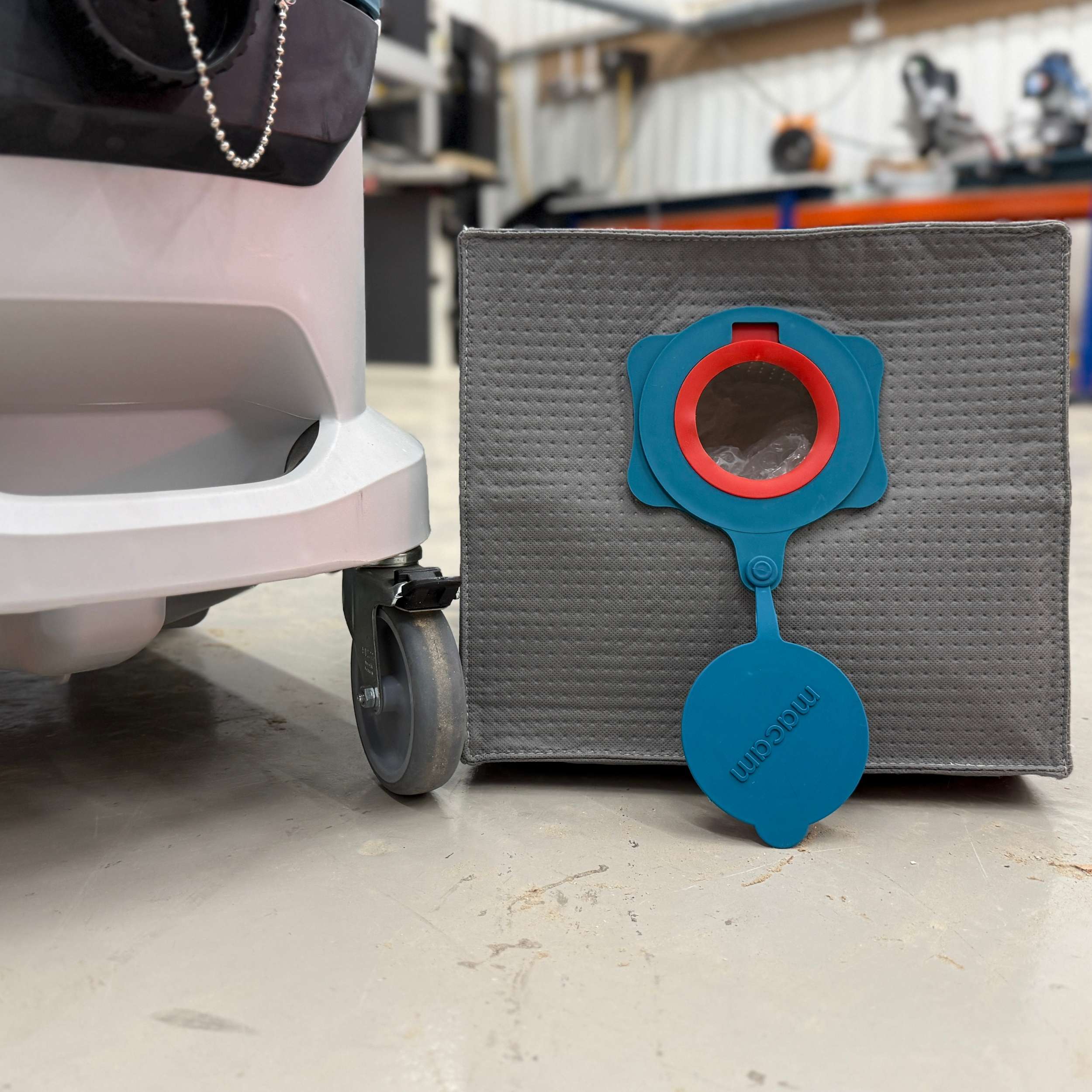 Reusable dust bag for Makita VC4210 emptied and shaken out for reuse